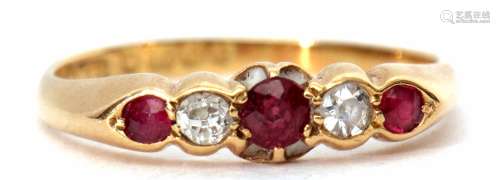 Early 20th century 18ct ruby and diamond five stone ring, alternate set with three graduated