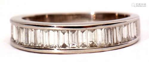 Precious metal and diamond half eternity ring featuring graduated channel set baguette set diamonds,