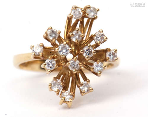 Modern diamond designer ring, featuring 15 small diamonds, each individually claw set and raised