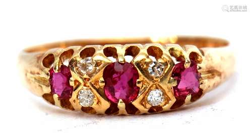 18ct gold ruby and diamond ring featuring 3 oval shaped rubies interspersed with 4 small diamonds,