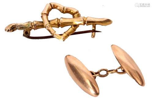 Mixed Lot: one 9ct gold torpedo cuff link with chain connector, 7.5gms, together with a 9ct gold