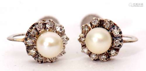 Pair of 9ct white gold diamond and cultured pearl cluster earrings of flower head design, with screw