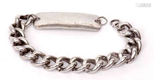 Hallmarked silver identity bracelet, the heavy gauge curb link bracelet supporting a rectangular