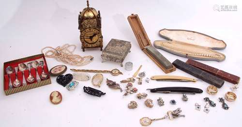 Large box to include modern lantern clock, various wrist watches, brooches, rings etc