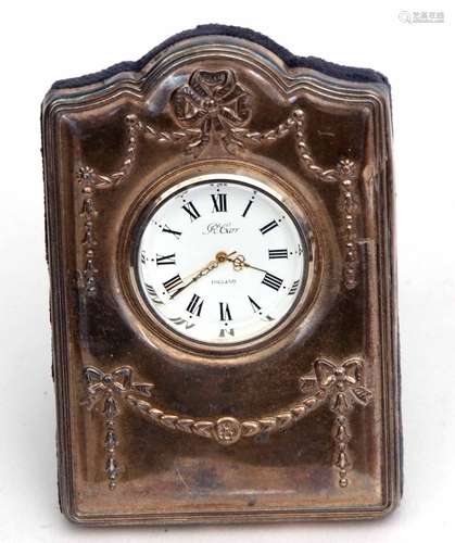 Elizabeth II silver mounted easel backed quartz timepiece, the shaped rectangular mount to a