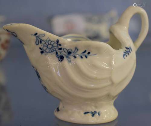 Lowestoft porcelain dolphin shaped ewer, the moulded body with a blue and white design, 9cm long