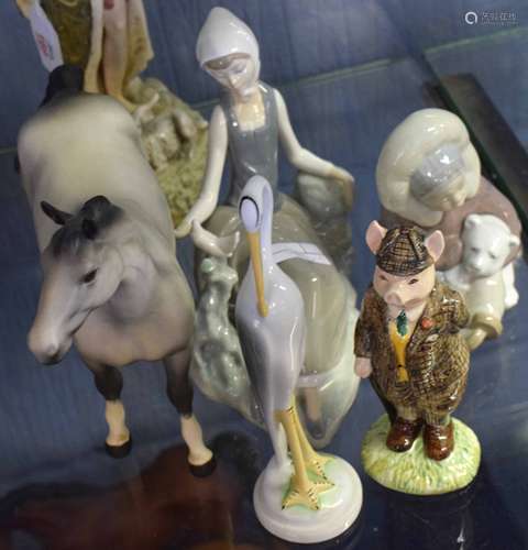 Group of various porcelain models including a Beswick horse, a pig, two Lladro models of children (