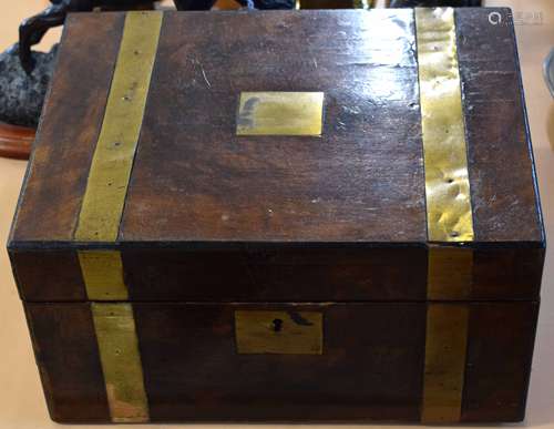 Victorian mahogany writing box with brass strapwork mounts, central vacant name plate, fitted