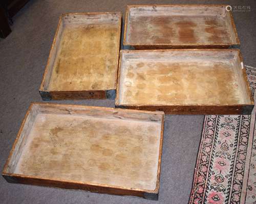 Set of four vintage pine and metal banded trays of rectangular form, bear traces of manufacturer/