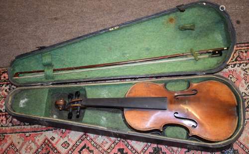 Vintage violin with indistinct retailer's/maker's label, in case with two bows, 60cm long