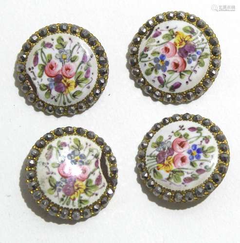 Group of four late 19th century gilt buttons, the centres with enamel decoration painted with floral