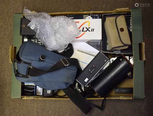 Large box of various camera equipment includes Zenit camera, Roniflex X3000 camera, various