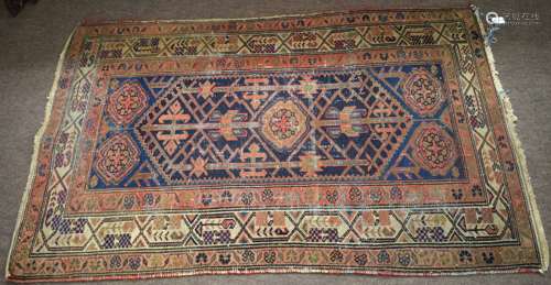 Vintage wool prayer rug, central panel of geometric lozenge triple gull border, mainly puce and blue