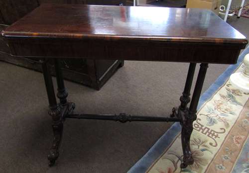 Victorian rosewood small centre table of rectangular form, raised on reeded supports, joined by a