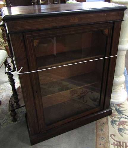 Inlaid Victorian pier cabinet, glazed door enclosing fitted shelving on a plinth base, 76cm wide