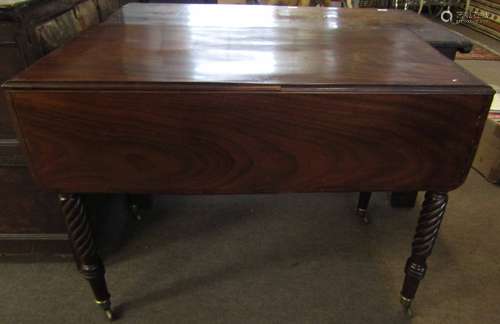 19th century mahogany Pembroke table with two drop flaps, one end frieze drawer, raised on twisted