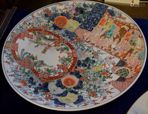 Large Japanese porcelain charger, Meiji period, decorated in polychrome with attendants and