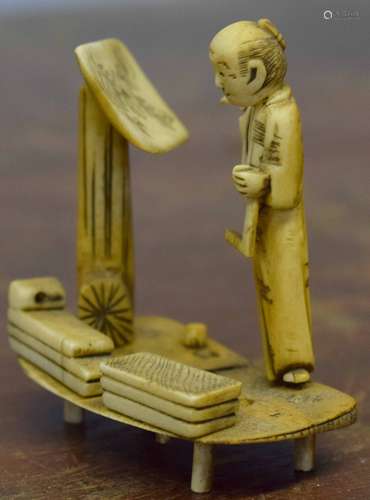 Early 20th century Okimono modelled as an artist at his easel standing on a rectangular base, 6cm