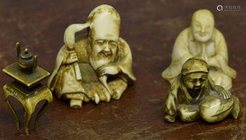 Group of three early 20th century ivory Inro together with a small miniature model of a table,