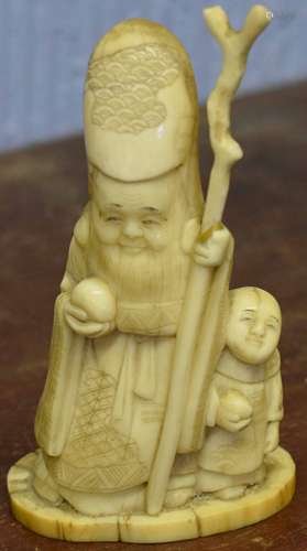 Early 20th century ivory model of an immortal, probably Shou Lao, 10cm high