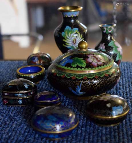 Group of cloisonne wares including vases, small bowls and cover, all with typical enamel decoration,