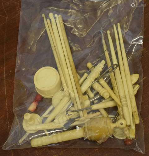 Bag containing various sewing implements with ivory handles and some assorted counters