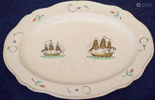 French creamware lobed dish decorated with sailing ships, the base impressed Au Havre with