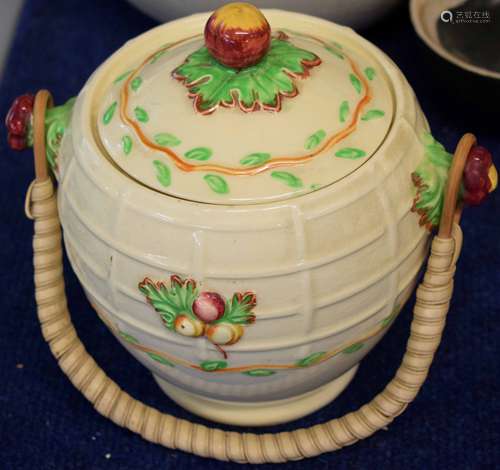 1930s biscuit barrel made by Wilkinson in the style of Clarice Cliff, the biscuit barrel with wicker