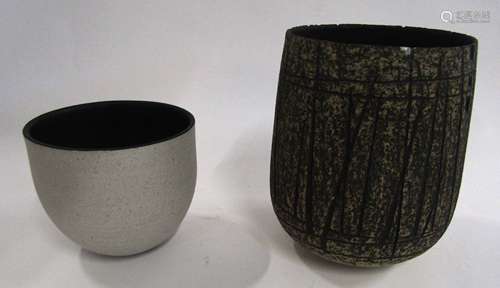 Louise Darby (born 1959) Pair of Studio Pottery vases, one with an incised design on grey ground,