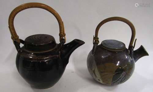 Two Studio Pottery tea pots with bamboo handles, both indistinctly marked