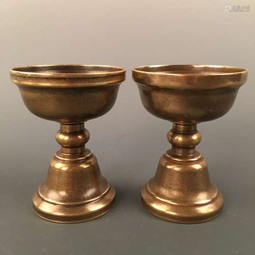 A Pair of Chinese Bronze Candle Holder