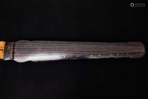 A Chinese Carved Wood Instrument