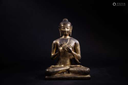 A Chinese Gilt Bronze Buddha