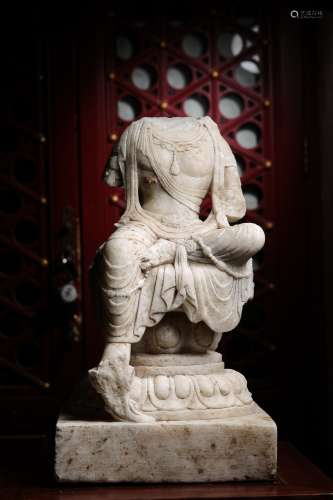 A Chinese Carved Stone Buddha