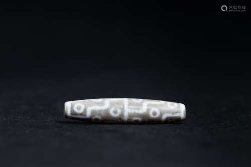 A Chinese Carved Agate DZI Bead