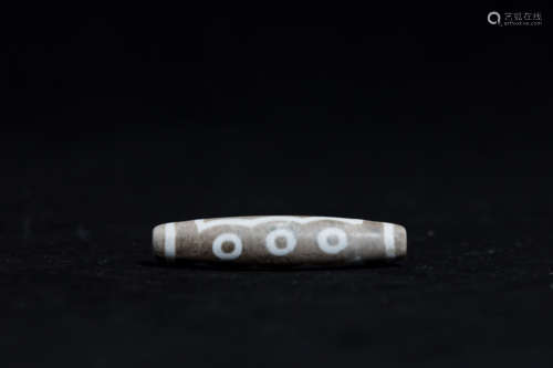 A Chinese Carved Agate DZI Bead