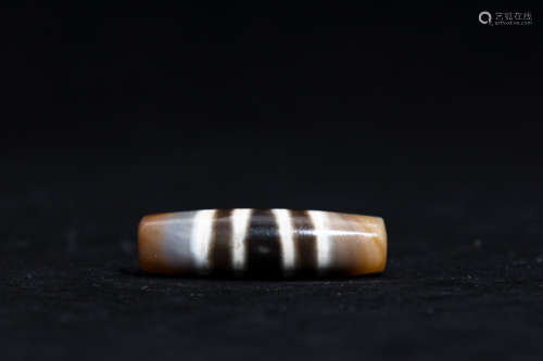 A Chinese Carved Agate DZI Bead