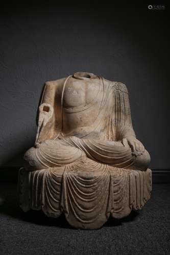 A Chinese Carved Stone Buddha