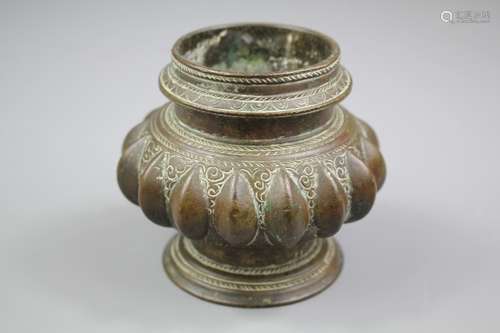 An Antique Mogul Brass Mortar; the mortar in the form of a fruit