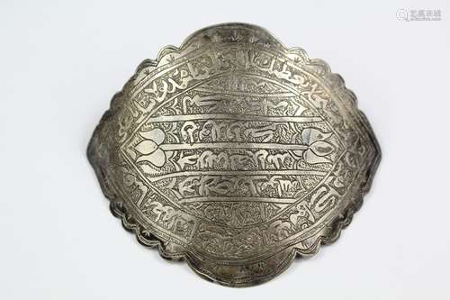 An Antique Arabic Silver Amulet; the amulet engraved with Arabic script, approx 13 x 14 cms