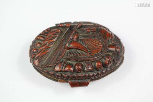 A 19th Century French Coquilla Nut Snuff Box; the snuff box depicting a Trophy of Arms, approx 7 x 3 cms
