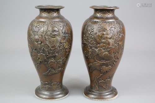 Japanese Bronze Vases; the vases depicting monkeys in a tree, together with birds carrying fruit, approx 17 cms h