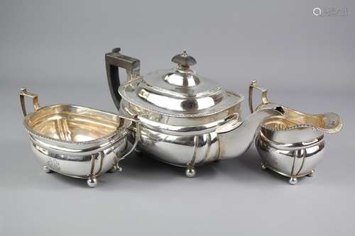 A Three Piece Silver Tea Trio; the set comprising teapot, double handle sugar bowl and milk jug, London hallmark, dated 1910, mm Elkington & Co, approx 900 gms