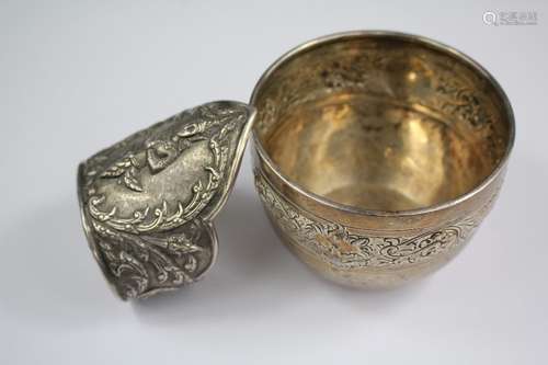 A Victorian Silver Sugar Bowl, London hallmark dated 1888, mm JSB approx 0together with a Siamese Silver Cuff Bracelet, embossed with a deity, stamped sterling