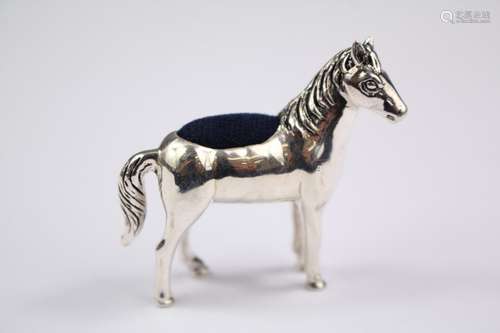 A Silver Pin Cushion, modelled as a horse, approx 4 x 4  cms, approx 18