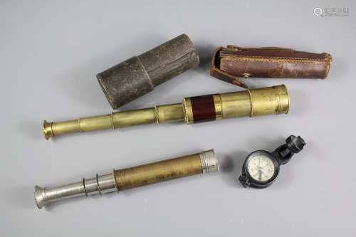 A 19th Century Four Drawer Pocket Telescope, unmarked together with another late 19th Century B P Telescout (Boy Scout) three drawer pocket telescope in the original leather case together with a vintage chart reader and compass