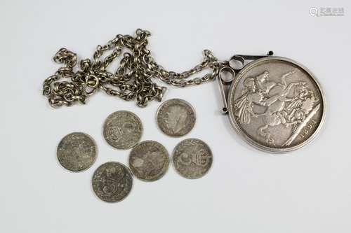 A Victorian Crown, mounted in silver and suspended from a silver chain together with six 3d coins, approx 53 gms