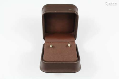 A Pair of  Lady's 14ct Gold Diamond Stud Earrings, approx 24 pts of dias