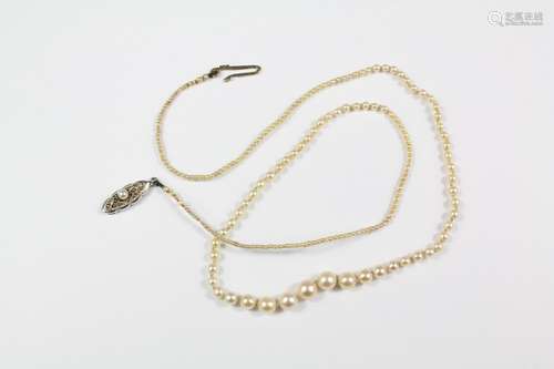 A Very Fine Antique Graduated Pearl Necklace, approx 38 cms, with a 9ct white gold clasp, pearls ranging from 1mm to 4mm, approx weight without clasp 3