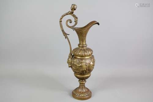 A Brass Corinthian Vase; the vase depicting cherubs, approx 41 cms h